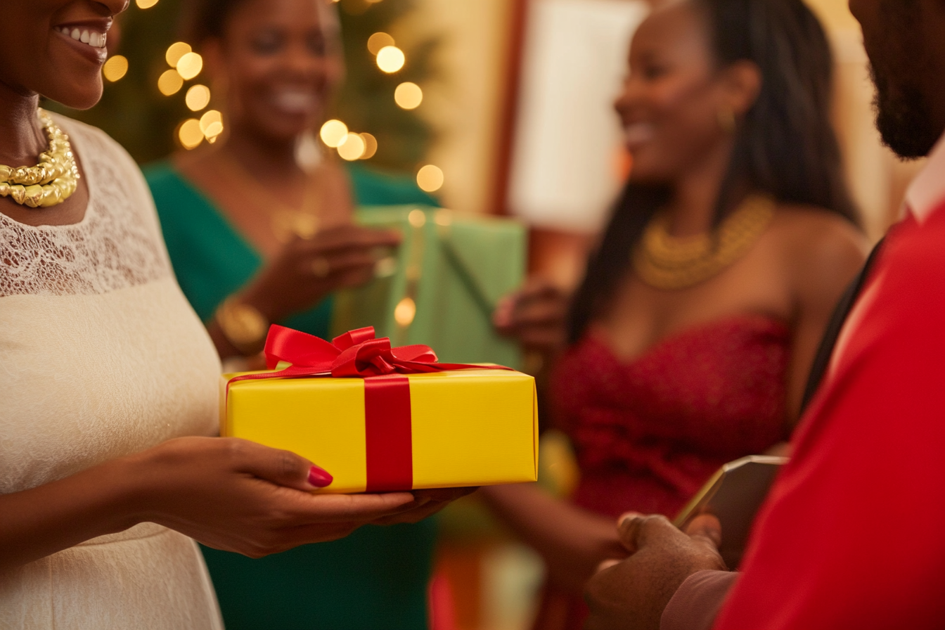 Close-up of people exchanging gifts at a festive Christmas party, featuring warm lighting and cheerful holiday decorations.